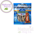 A package of Antos Capelin Premium Fish Treats for dogs, displayed on a white background with a 'Natural Dog Co.' logo overlay on the top left and a faint watermark at the bottom right.