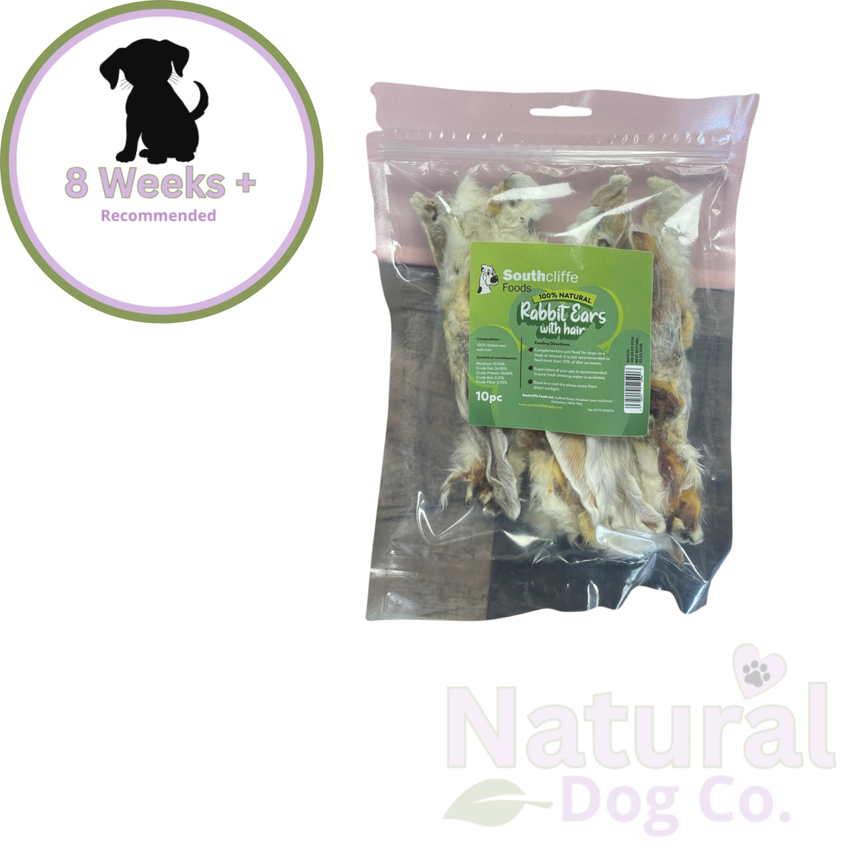 Southcliffe Foods Rabbit Ears with Hair 165g bag, 10 natural air dried rabbit ear dog treats, single ingredient, on a dark surface with Natural Dog Co branding and 8 Weeks+ age recommendation badge.