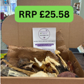 An open cardboard box filled with dried dog treats and a branded card from Natural Dog Co., with a bright green overlay reading 'RRP £25.